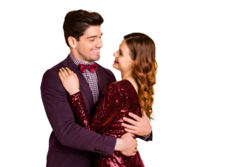 Portrait of his he her she nice-looking attractive lovely lovable smart charming pretty sweet cheerful cheery people cuddling spending festal day isolated over bright vivid shine yellow background