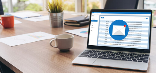 Email notification message showing on computer screen snugly. Digital marketing message information text from business to customer client
