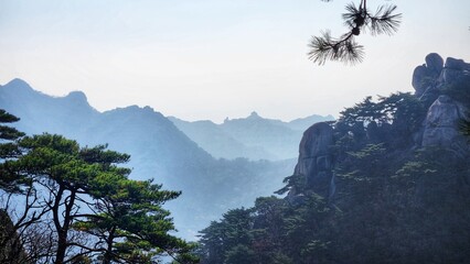 fog in the mountains. Smoky cloudy mountains And trees. Bukhansan National Park, South Korea....
