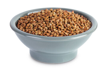 Raw buckwheat in ceramic bowl isolated on white background