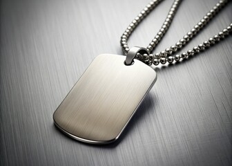 Fototapeta premium Minimalist Brushed Steel Military Dog Tag Pendant on Silver Chain - Sleek Design for Modern Accessories and Personalization