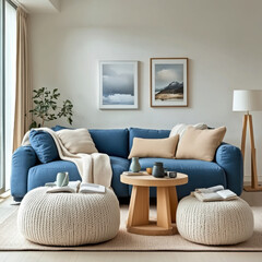 Two knitted poufs near dark blue corner sofa. Scandinavian home interior