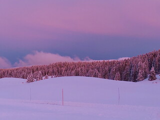 mountain cottage view on cloudy forest by sunset