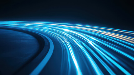 Abstract motion trails of blue light on a dark background, creating a dynamic and energetic atmosphere for creative projects.