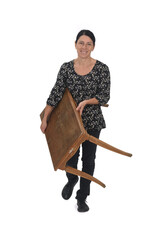 front view of a woman carrying  old table on white background