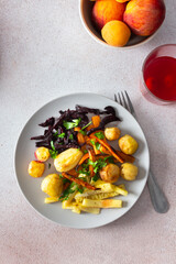 This nutritious meal includes oven-baked potatoes, zucchini, carrots, and beets, served with a refreshing cherry compote, making for a balanced and flavorful breakfast or lunch