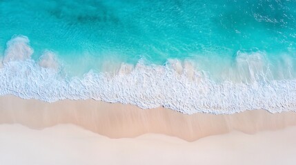 Fototapeta premium Aerial View of Turquoise Ocean Waves and Foam on Sandy Beach