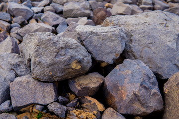 Stacked gray rocks, erosion of stones