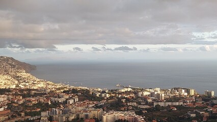 Obraz premium Sky, clouds, orange, yellow, blue, nature, outdoor, outside, island, beach, coastline, coast, landscape, rock, mountain, cliff, relax, peace, paradise, madeira island, island, tree