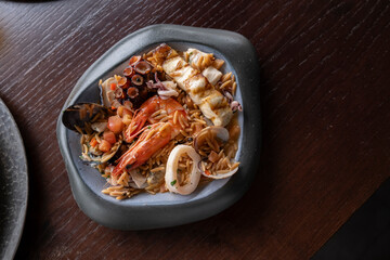 shrimp, octopus, salmon, mussel dinner plate