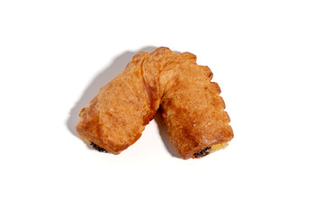 Pastries lie on a white background. The pastry is brown and has a sweet taste. Sweet pastries isolated on white background.