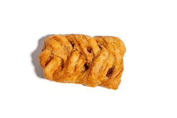 A pastry with a spiral design and a sprinkle on top. The pastry is brown and looks delicious Sweet...