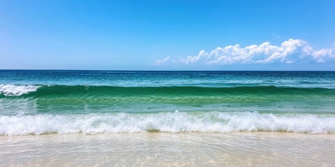 Serene Beachfront Scene with Gentle Waves, Crystal Clear Water, and a Brilliant Blue Sky Under Soft White Clouds on a Sunny Day