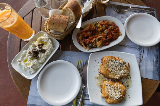 soufico the island&rsquo;s national dish with Saganaki and authentic Greek Tzatziki sauce, Ikarian longevity food, Blue Zone Recipes, mediterranean diet of Ikaria