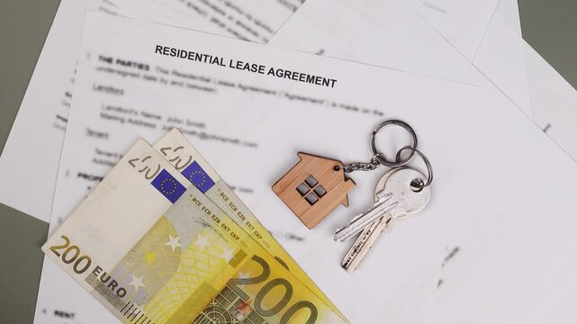 Rental or Residential Lease agreement, Euro money cash, and house keys. Short and long term rentals, housing searching crisis in Europe, signing contract, and rising prices.