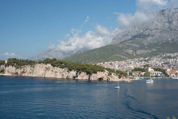 Seaside view of Makarska city surrounded by mountains, Dalmatian region, Makarska Riviera, Croatia.