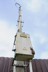 Electricity box on a pole.