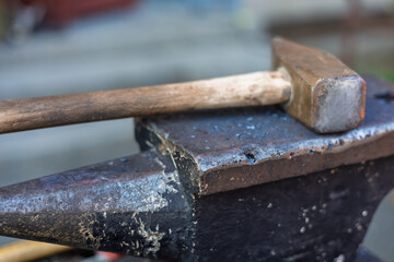 Blacksmith's tools. Anvil, pliers, hammer, fire, iron