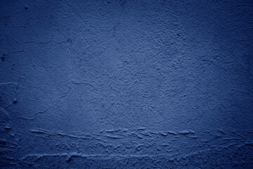 Blue dark textured old stucco wall background