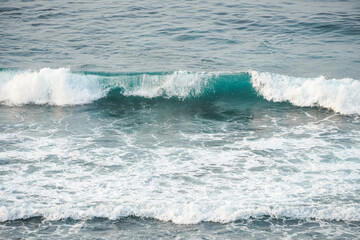 Fototapeta premium Dangerous high tide wave on the beach. Watu Karung beach, Pacitan, East Java, Indonesia.