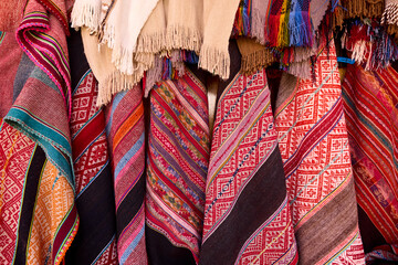 Vibrant threads of tradition.This stunning handmade textile from Pisac brings the rich colors and culture of the Andes to life. Every stitch tells a story, weaving together history, art, and community