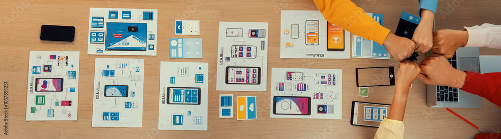 Aufkleber top view banner of startup company ui or ux developer joining hand over user interface prototype for