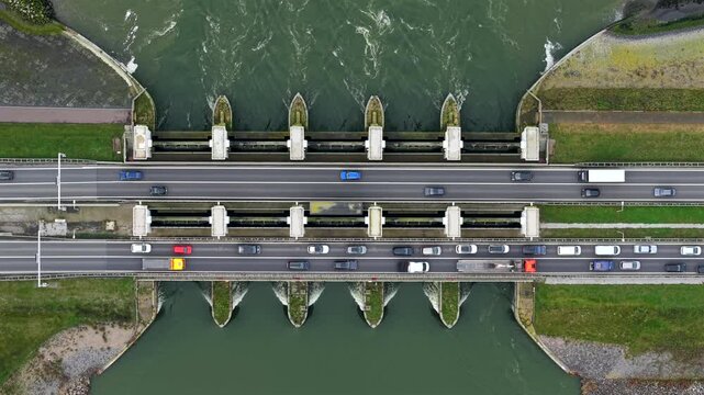Topdown aerial of sea water discharge sluice highway Netherlands