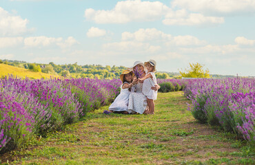 Family in lavender field. Selective focus.