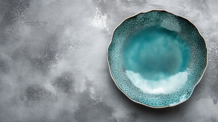 Blue Ceramic Plate on Grey Background