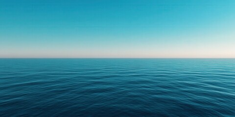 Obraz premium Tranquil blue ocean view under clear sky at sunrise on the horizon