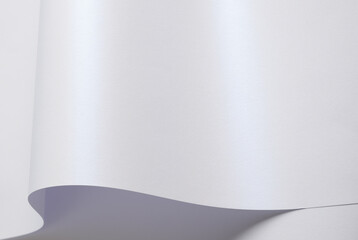 Pearle glossy paper background with a glowing iridescent texture. Pastel shine and smooth surface...