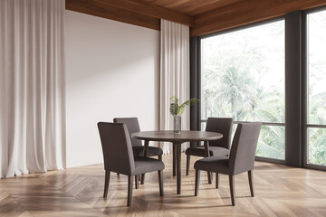 Modern dining room with circular wooden table and four chairs in natural light and minimalist design. 3D Rendering