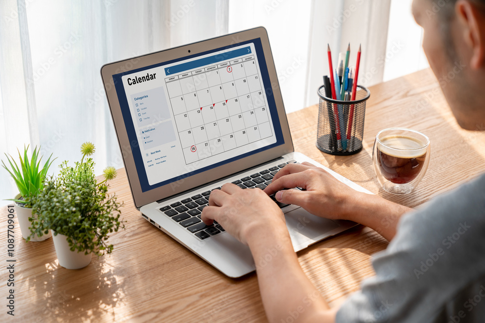 Poster calendar on computer software application for modish schedule planning for personal organizer and on