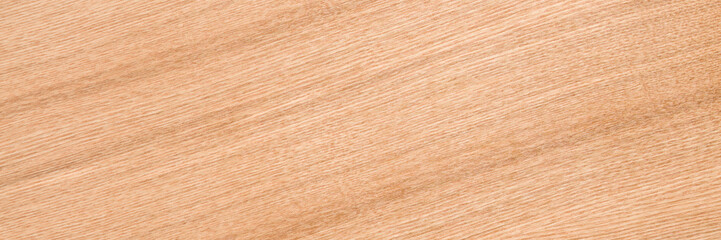 Fototapeta premium Light ash veneer wooden surface background. Closeup. Wide banner. Empty place for text. Top down view.