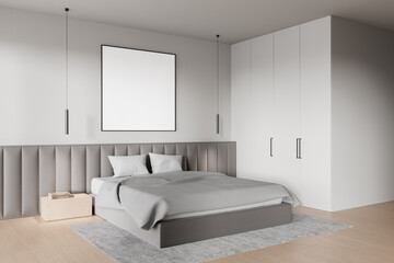 Modern bedroom with a blank poster on the wall, featuring a bed and minimalist decor. Perfect for mockup and interior design concepts. 3D Rendering