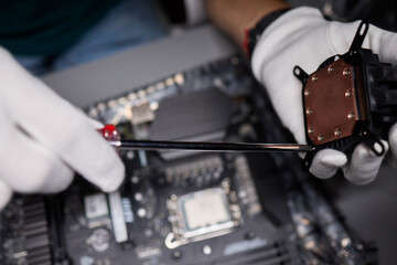 Obraz premium The process of properly installing a CPU cooler water cooling in a custom built personal computer system