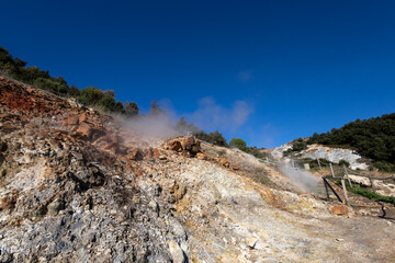 Geysers also known as "soffioni boraciferi" with sulphurous steams used to produce geothermal energy, in the nature park of the Biancane, Monterotondo Marittimo, near Larderello, Tuscany, Italy