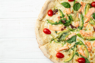 Italian pizza with avocado salmon  tomatoes and mozzarella photography. top view