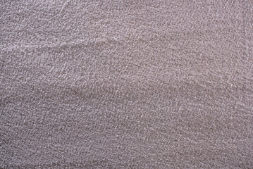 Beige gold velvet background or velour flannel texture made of cotton or wool with soft fluffy...