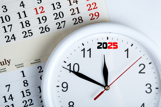 sheet of a calendar with clockface