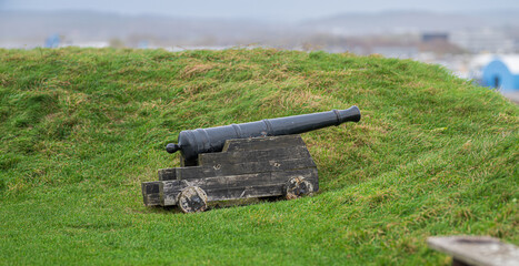 Canon defending an old fortress.