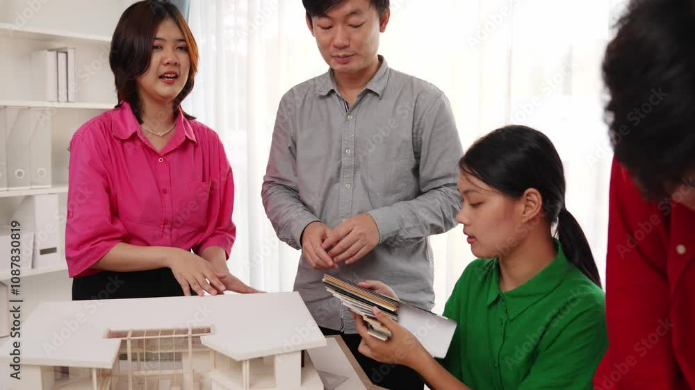 Poster slow motion home designer using architectural equipment draw a blueprint while interior designer sel