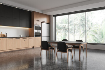 Sleek modern kitchen with wooden cabinets, dining table, chairs, and large windows. Minimalistic design. Home interior concept. 3D Rendering