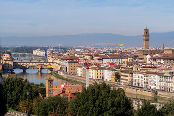 Obraz premium Florence, Italy - November 5, 2024: Florence cityscape and The Ponte Vecchio (Old Bridge).