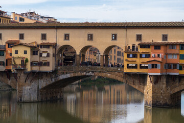 Obraz premium Florence, Italy - November 5, 2024: Florence cityscape and The Ponte Vecchio (Old Bridge).