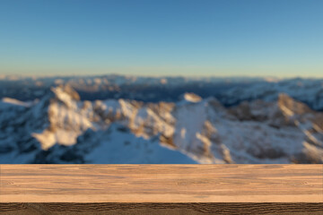 wood table top on blur background of river and mountain - can be used for display or montage your...