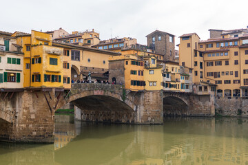Obraz premium Florence, Italy - November 5, 2024: Florence cityscape and The Ponte Vecchio (Old Bridge).