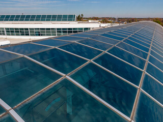 Daytime Drone Images of a Large Commercial TPO Roof With Unique Skylights and an Atrium