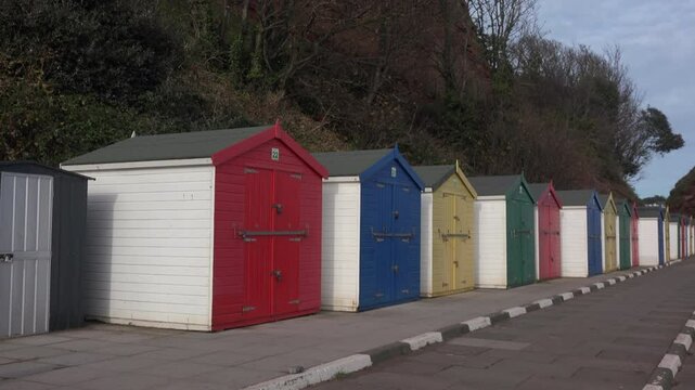 South coast of England beach huts for vacation in leisure time. Dawlish beach for thatcher's UK 4K