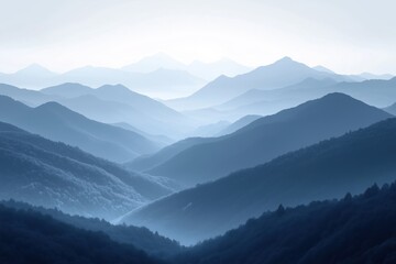 Obraz premium Layered blue mountain range in misty light